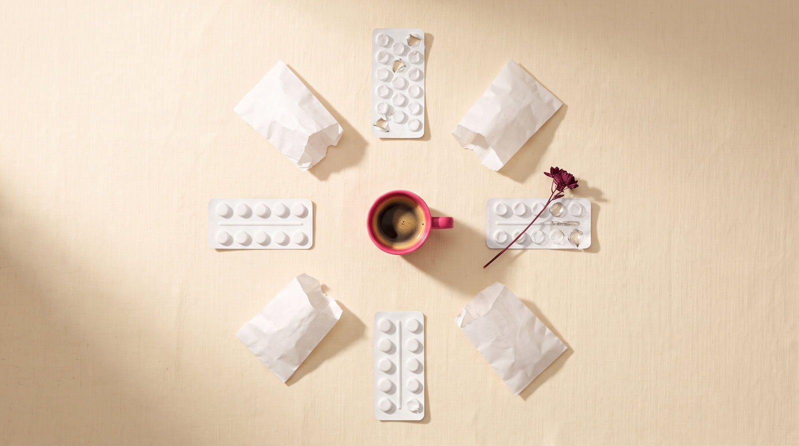 a year of finished pill courses arranged in a circle &mdash; the loop, laid out on a table