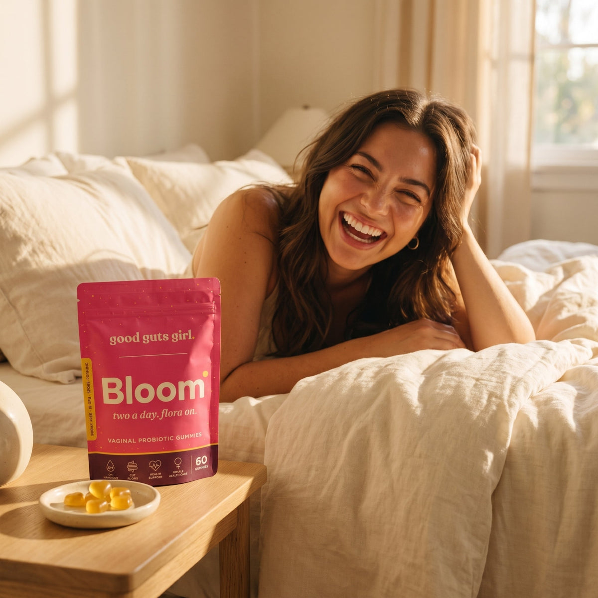 woman relaxed at home with bloom on the nightstand — never think about it again